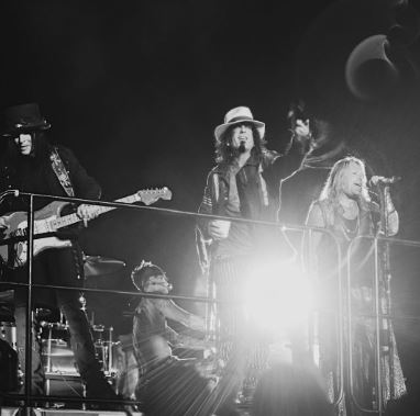 Seraina Schonenberger husband Mick Mars performing with his band Motley Crue